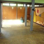 Another view from living area into den.  Lots of mastic to get off those floors.  The floor buffer really came in handy.